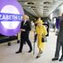 Smiling Queen uses oyster card as she makes surprise appearance to see new Elizabeth line in London
