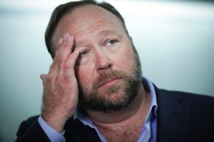 “Stop Alex Jones”: Sandy Hook Conspiracy Theorist Ordered to Pay Nearly $50 Million in Damages To Victim’s Parents