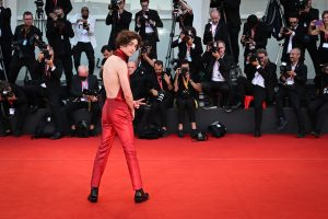 Timothée Chalamet Causes Transoceanic Commotion With Backless Outfit in Venice