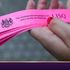 eBay bids for used Queen’s laying in state queue wristbands reach into the thousands
