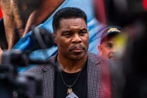 “È solo curiosità”: Incontro con il giornalista che si nasconde dietro le bombe di Herschel Walker