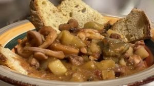 Polpi e calamari con patate e carciofi