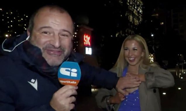 Breaking news: Una sfacciata tifosa degli Hearts interrompe la diretta televisiva italiana per mostrare la parte inferiore del suo seno – Daily Mail