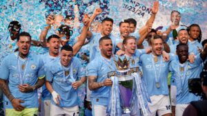 Il Man City vince il quarto titolo di fila in Premier League, un record